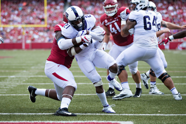 FAYETTEVILLE, AR - SEPTEMBER 9: Kyle Hicks #21 of the TCU Horned Frogs runs the ball in for a touchdown against the Arkansas Razorbacks at Donald W. Reynolds Razorback Stadium on September 9, 2017 in Fayetteville, Arkansas. (Photo by Wesley Hitt/Getty Images)