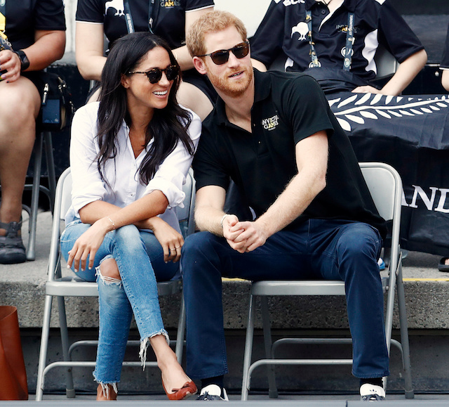 Britain's Prince Harry (R) arrives with girlfriend actress Meghan Markle at the wheelchair tennis event during the Invictus Games in Toronto, Ontario, Canada September 25, 2017. REUTERS/Mark Blinch 