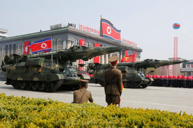 Missiles are driven past the stand with North Korean leader Kim Jong Un and other high ranking officials during a military parade marking the 105th birth anniversary of North Korea's founding father, Kim Il Sung, in Pyongyang, April 15, 2017. REUTERS/Sue-Lin Wong