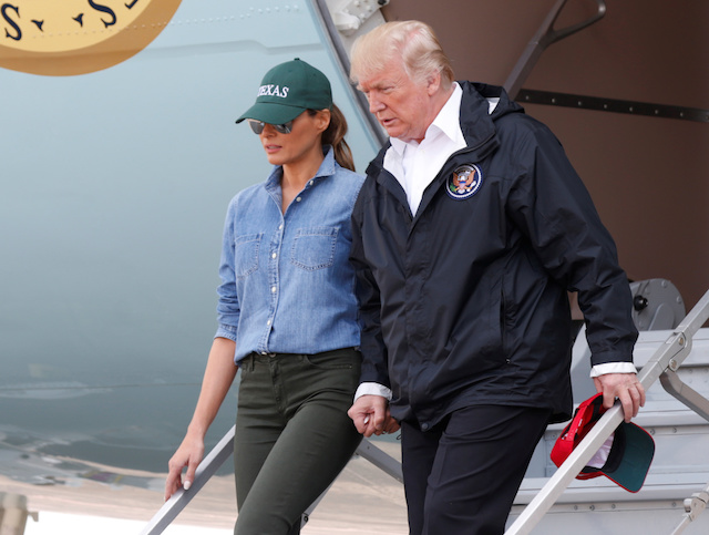 U.S. President Donald Trump and first lady Melania Trump deplane after arriving at Ellington Field to meet with flood survivors and volunteers who assisted in relief efforts in the aftermath of Hurricane Harvey, in Houston, Texas, U.S., September 2, 2017. REUTERS/Kevin Lamarque - RC1D7776B4B0