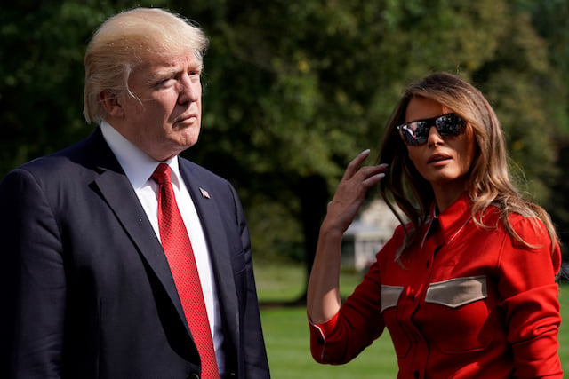 U.S. President Donald Trump talks to the media about Hurricane Irma next to first lady Melania Trump on the South Lawn the White House upon their return to Washington, U.S., from Camp David, September 10, 2017. REUTERS/Yuri Gripas - RC14D0EA0FD0
