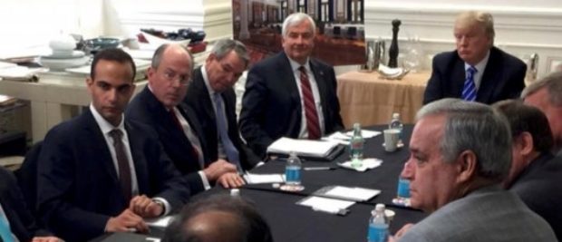George Papadopoulos (3rd L) appears in a photograph released on Donald Trump's social media accounts with a headline stating that the scene was of his campaign's national security meeting in Washington, D.C. on March 31, 2016 and published April 1, 2016. Social Media/Handout via REUTERS