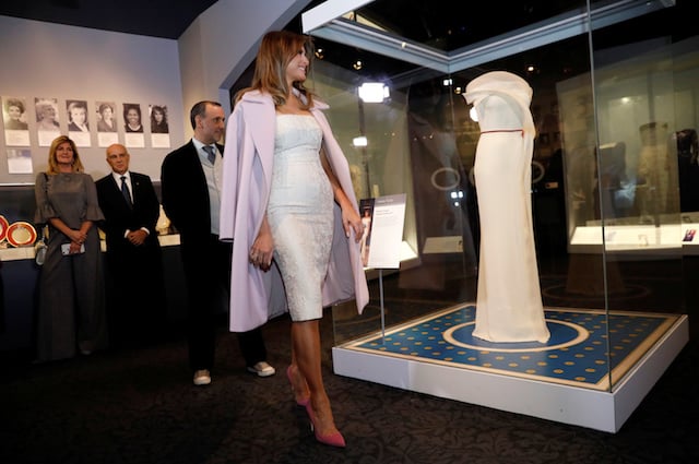 U.S. first lady Melania Trump views the display of her inaugural gown after presenting it to the Smithsonian's National Museum of American History in Washington, U.S., October 20, 2017. REUTERS/Kevin Lamarque 