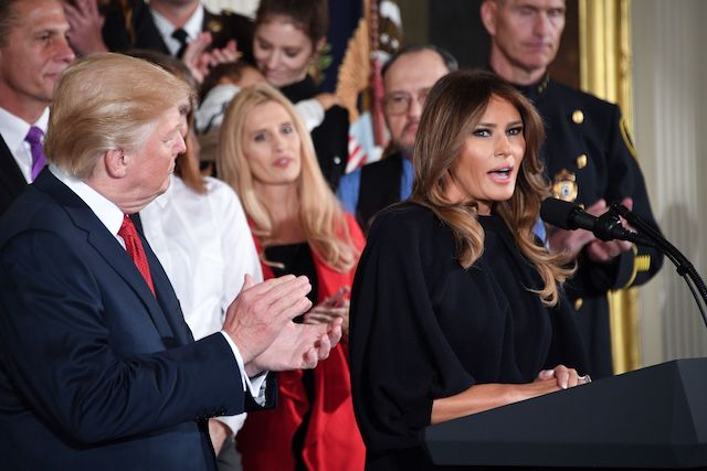 First Lady Melania Trump speaks before US President Donald Trump delivers remarks on combating drug demand and the opioid crisis on October 26, 2017 in the East Room of the White House in washington, DC. US President Donald Trump on October 26, 2017 is to declare the opioid crisis a "nationwide public health emergency," stepping up the fight against an epidemic that kills more than 100 Americans every day, officials said. / AFP PHOTO / JIM WATSON (Photo credit should read JIM WATSON/AFP/Getty Images)