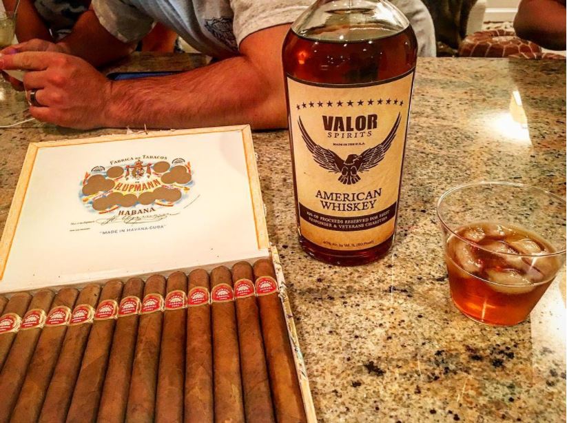 Valor and a box of cigars. Photo: courtesy of Valor Spirits.