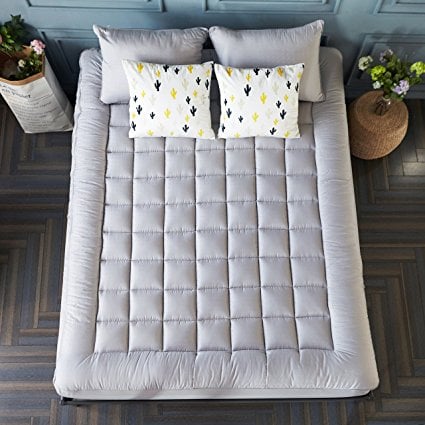 Normally $370, this mattress pad cover is 81 percent off (Photo via Amazon)