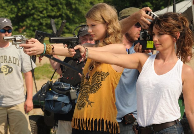 THOMPSON'S STATION, TN - JUNE 06: Singers and Songwriters Taylor Swift and Shania Twain during the recreation of "Thelma & Louise" for CMT Music Awards airing on June 8, 2011 8pm EST on CMT Country Music TV. This Segment taped on June 6, 2011 in Thompson's Station, Tennessee. (Photo by Rick Diamond/Getty Images for CMT)