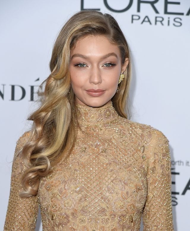 Gigi Hadid Stuns On Red Carpet In Sheer Gold Lace Dress
