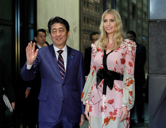 Ivanka Trump (R), Advisor to US President Donald Trump, is welcomed by Japanese Prime Minister Shinzo Abe for a dinner at a restaurant in Tokyo, Japan, 3 November 2017. REUTERS/Kimimasa Mayama/Pool - 