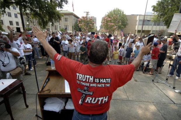 JACKSON, MS - JULY 17: The Rev. Philip Benham of Concord, North Carolina, director of Operation Save America, leads a demonstration to close the state's only abortion clinic on the capital steps July 17, 2006 in Jackson, Mississippi. The demonstration drew hundreds of pro-life and pro-choice protestors from around the country. (Photo by Marianne Todd/Getty Images)