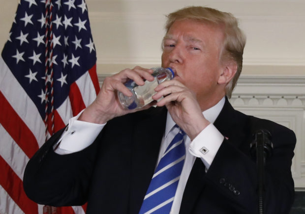U.S. President Donald Trump takes a drink of water while speaking in the Diplomatic Room of the White House in Washington, U.S., November 15, 2017. REUTERS/Kevin Lamarque - HP1EDBF1MS4SH