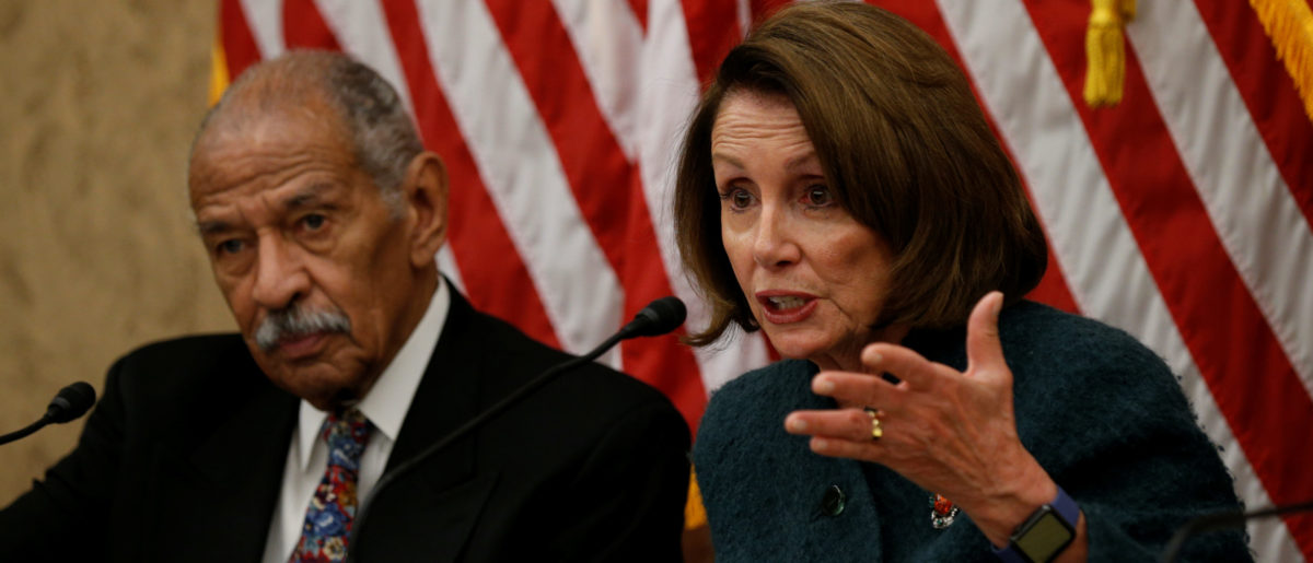 House Minority leader Nancy Pelosi and Rep. John Conyers take part in a discussion panel on President Trump's Muslim and refugee ban in the U.S. Capitol in Washington, U.S., February 2, 2017. REUTERS/Kevin Lamarque - RC1668F9F560