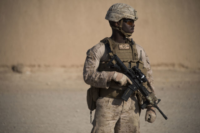 Lance Cpl. Martin serves during a visit to the Regional Military Training Center in Helmand Province. (Hailey Sadler)