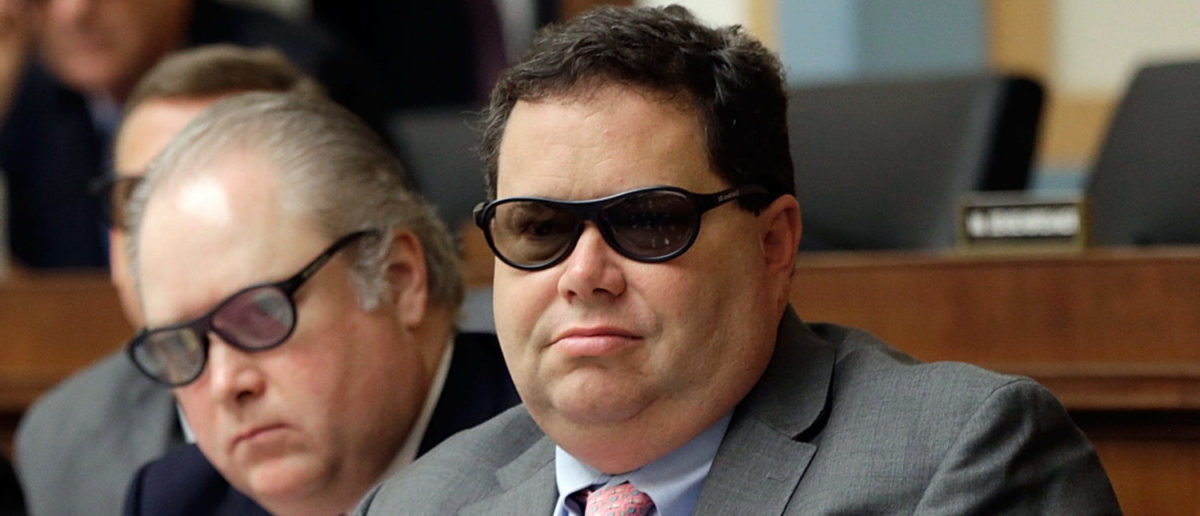 Rep. Blake Farenthold (R-TX), Rep. George Holding (R-GA), Rep. Ron DeSantis (R-FL) and Rep. Jason Smith (R-MO), join othermembers of the House Courts, Intellectual Property and the Internet Subcommittee in wearing 3D glasses while watching a demonstration of 3D technology on Capitol Hill July 25, 2013 (Photo by Win McNamee/Getty Images)