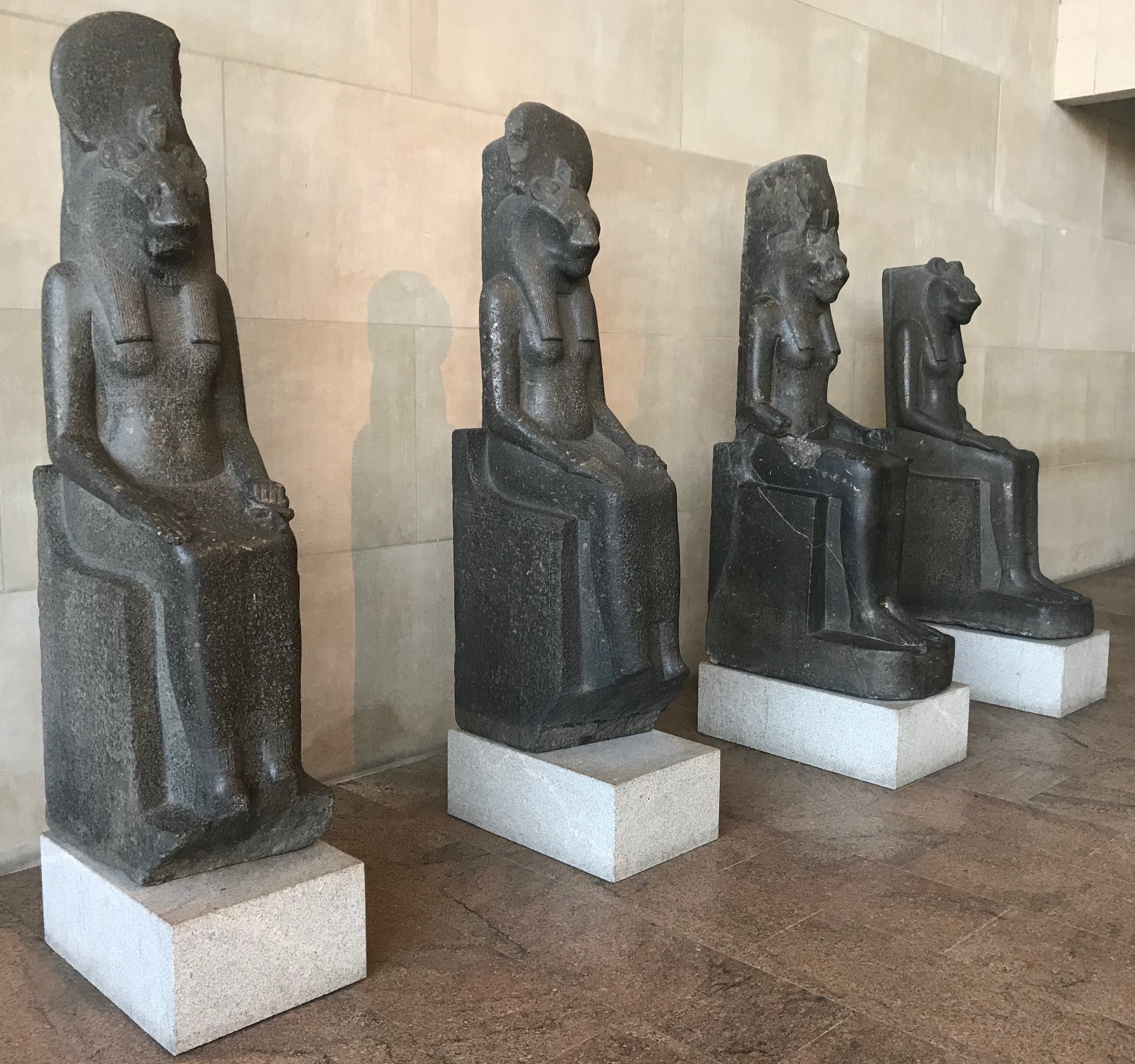 Four statues of the goddess Sachet face the Temple of Dendur in the Sackler Wing at the Metropolitan Museum of Art in New York City. (DCNF/Ethan Barton)