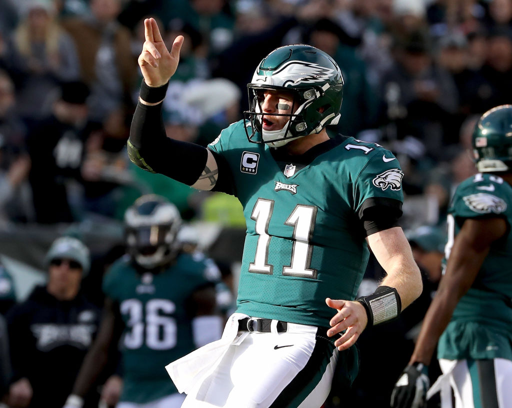 Carson Wentz celebrates his first down carry against the Chicago Bears in November 2017. (Photo by Elsa/Getty Images)