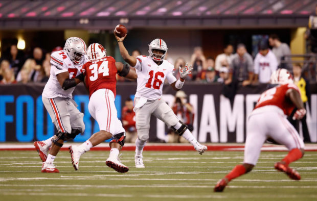 INDIANAPOLIS, IN - DECEMBER 02: Quarterback J.T. Barrett #16 of the Ohio State Buckeyes throws a pass against the Wisconsin Badgers during the Big Ten Championship game at Lucas Oil Stadium on December 2, 2017 in Indianapolis, Indiana. (Photo by Andy Lyons/Getty Images)