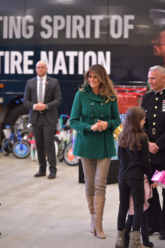US First Lady Melania Trump helps with the Marine Corps Reserve Toys for Tots Campaign at Joint Base Anacostia-Bolling in Washington, DC on December 13, 2017 / AFP PHOTO / MANDEL NGAN (Photo credit should read MANDEL NGAN/AFP/Getty Images)