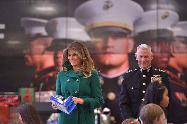 US First Lady Melania Trump helps with the Marine Corps Reserve Toys for Tots Campaign at Joint Base Anacostia-Bolling in Washington, DC on December 13, 2017 / AFP PHOTO / MANDEL NGAN (Photo credit should read MANDEL NGAN/AFP/Getty Images)