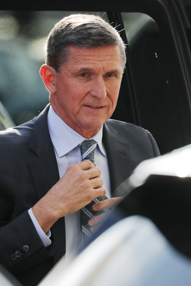 Former National Security Adviser Michael Flynn arrives for a plea hearing at U.S. District Court, where he is expected to plead guilty to lying to the FBI about his contacts with Russia's ambassador to the United States, in Washington, December 1, 2017. REUTERS/Jonathan Ernst