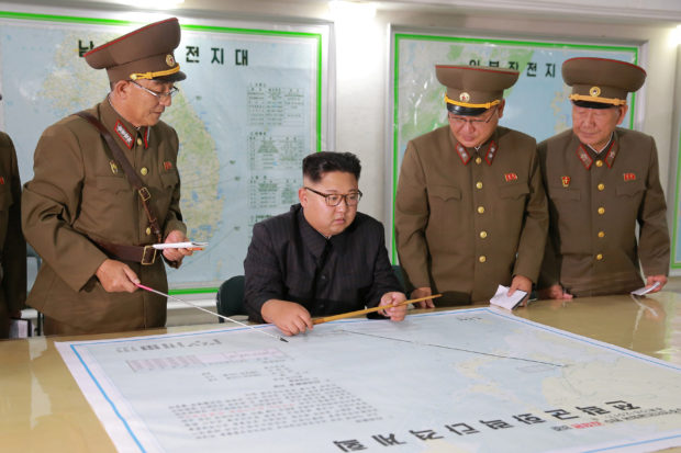 North Korean leader Kim Jong Un visits the Command of the Strategic Force of the Korean People's Army (KPA) in an unknown location in North Korea in this undated photo released by North Korea's Korean Central News Agency (KCNA) on August 15, 2017. KCNA/via REUTERS 