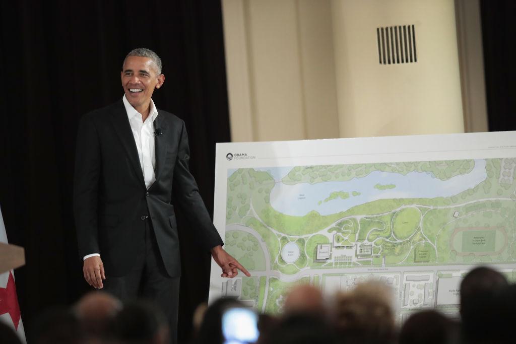CHICAGO, IL - MAY 03: Former President Barack Obama points out features of the proposed Obama Presidential Center, which is scheduled to be built in nearby Jackson Park, during a gathering at the South Shore Cultural Center on May 3, 2017 in Chicago, Illinois. The Presidential Center design envisions three buildings, a museum, library and forum. Obama was accompanied at the event by his wife Michelle who was making her first trip back to Chicago since leaving the White House in January. (Photo by Scott Olson/Getty Images)
