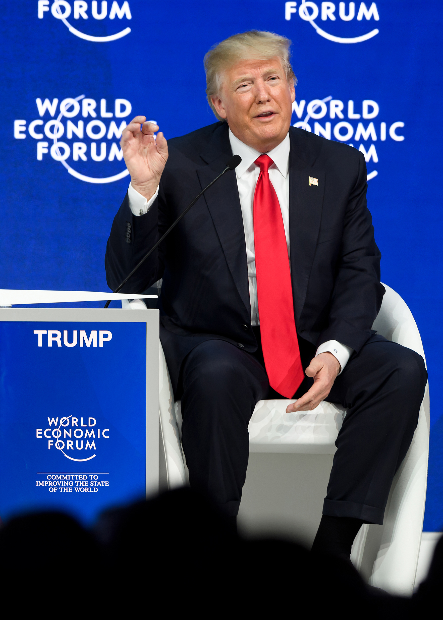 US President Donald Trump gestures as he speaks during a discussion during the World Economic Forum (WEF) annual meeting on January 26, 2018 in Davos, eastern Switzerland. / AFP PHOTO / Fabrice COFFRINI (Photo credit should read FABRICE COFFRINI/AFP/Getty Images)