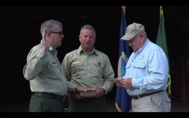 Tony Tooke sworn in by Agriculture Secretary Sonny Perdue as U.S. Forest Service chief. Photo: Screenshot/USDA/YouTube)