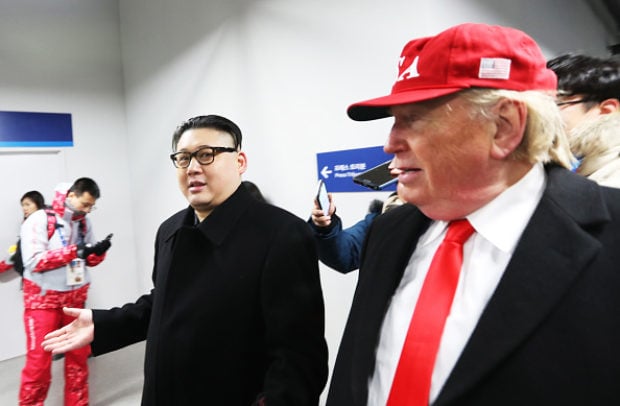 PYEONGCHANG-GUN, SOUTH KOREA - FEBRUARY 09: impersonators of Donald Trump and Kim Jong Un are escorted out of the ceremony during the Opening Ceremony of the PyeongChang 2018 Winter Olympic Games at PyeongChang Olympic Stadium on February 9, 2018 in Pyeongchang-gun, South Korea. (Photo by Richard Heathcote/Getty Images)
