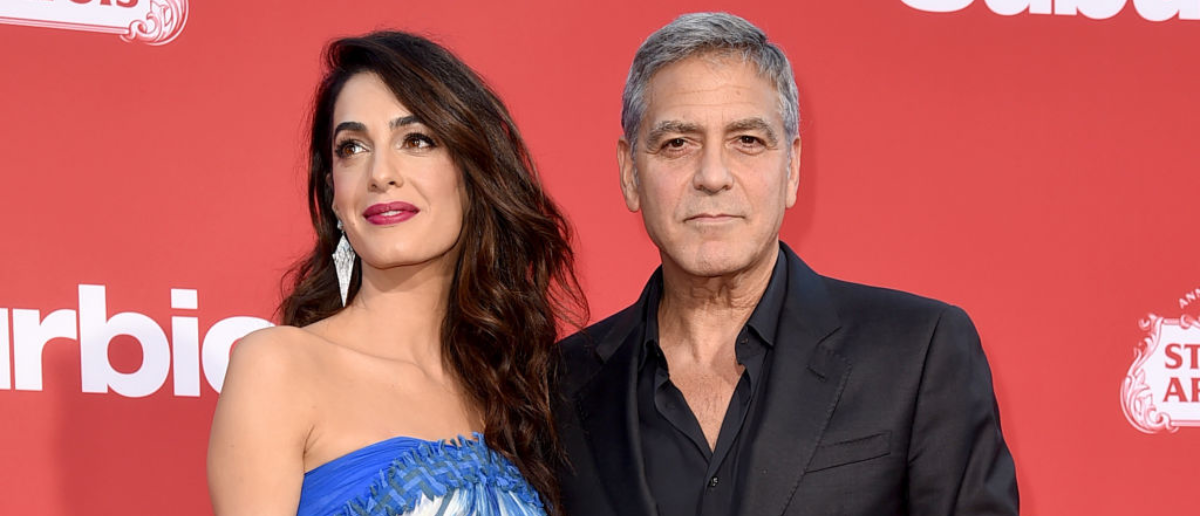 LOS ANGELES, CA - OCTOBER 22: Executive producer George Clooney (R) and his wife Amal Clooney arrive at the premiere of Paramount Pictures' 'Suburbicon' at the Village Theatre on October 22, 2017 in Los Angeles, California. (Photo by Kevin Winter/Getty Images)