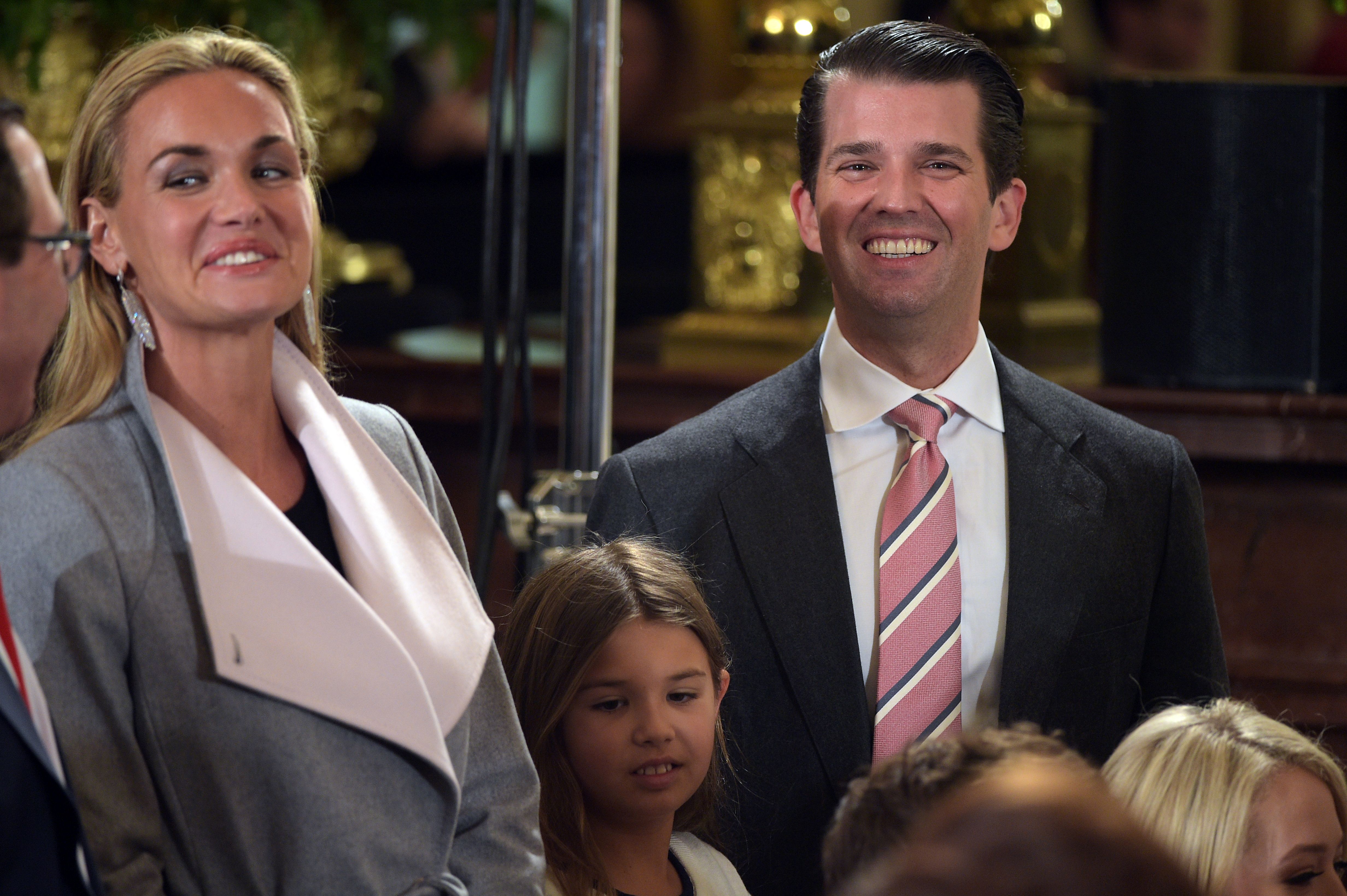Donald Trump, Jr., (R) his wife Vanessa (L) and their daughter Kai (C) attend the White House senior staff swearing in at the White House on January 22, 2017, in Washington, DC (MANDEL NGAN/AFP/Getty Images)