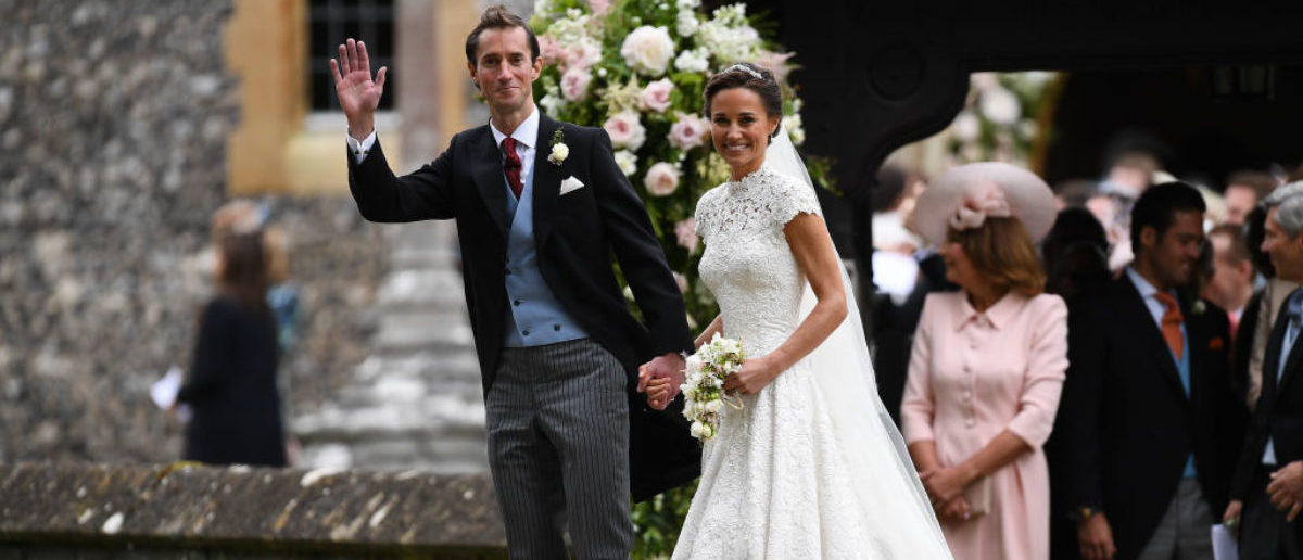 ENGLEFIELD GREEN, ENGLAND - MAY 20: Pippa Middleton and her new husband James Matthews leave church following their wedding ceremony at St Mark's Church as the bridesmaids and pageboys walk ahead on May 20, 2017 in Englefield Green, England. (Photo by Justin Tallis - WPA Pool/Getty Images)