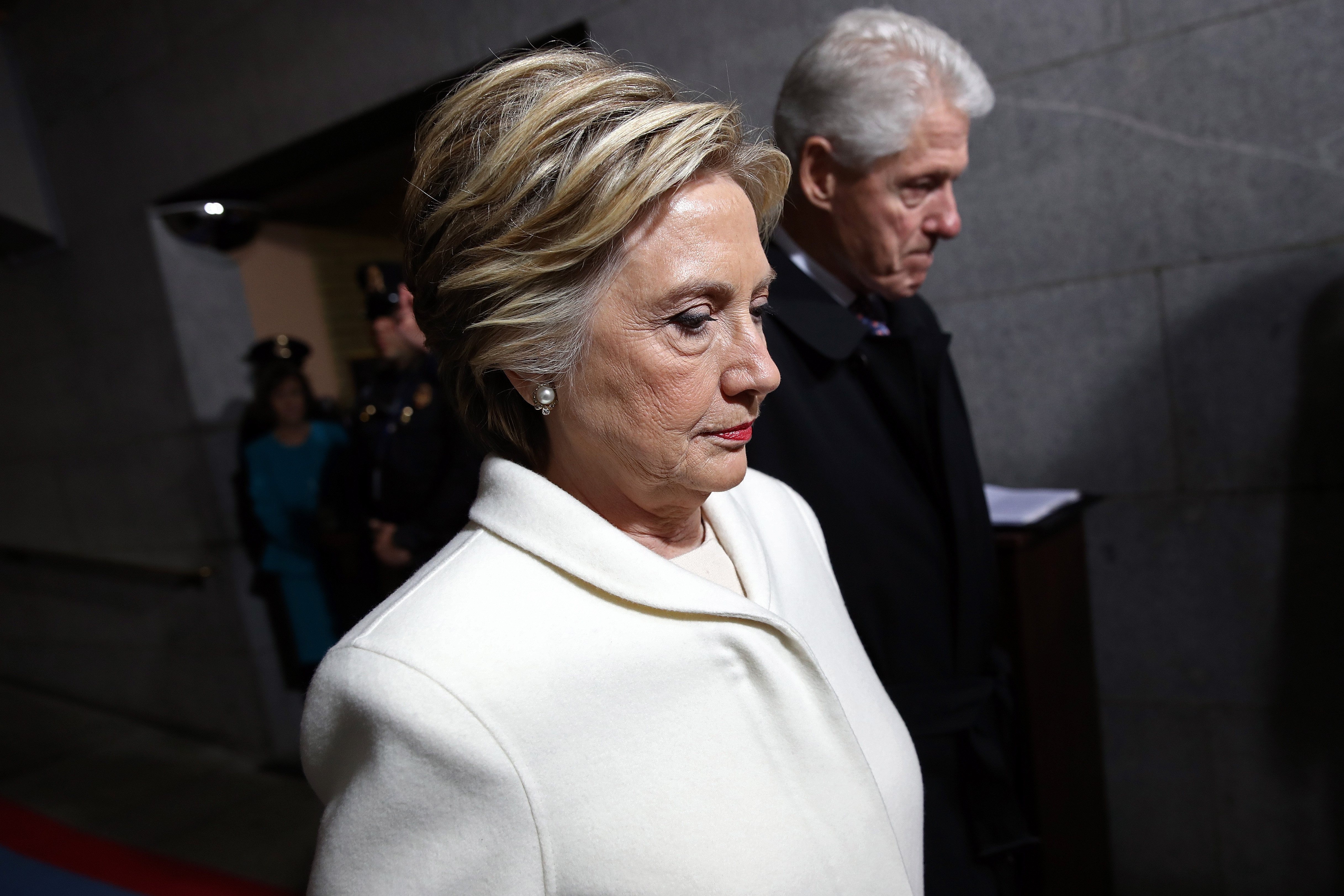 WASHINGTON, DC - JANUARY 20: Former Democratic presidential nominee Hillary Clinton (L) and former President Bill Clinton arrive on the West Front of the U.S. Capitol on January 20, 2017 in Washington, DC. In today's inauguration ceremony Donald J. Trump becomes the 45th president of the United States. (Photo by Win McNamee/Getty Images)