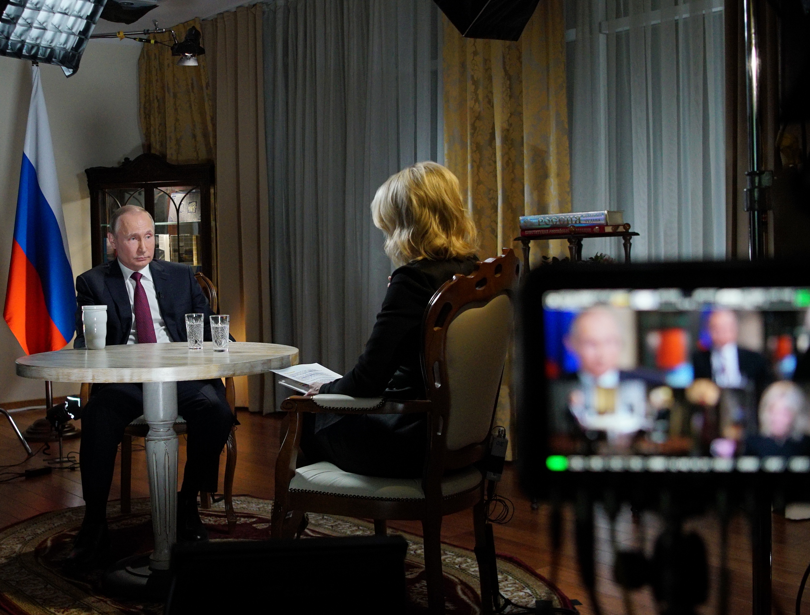 Russia's President Vladimir Putin (L) speaks with US NBC news network anchor Megyn Kelly at the Kremlin on March 1, 2018 in Moscow. (ALEXEI DRUZHININ/AFP/Getty Images)