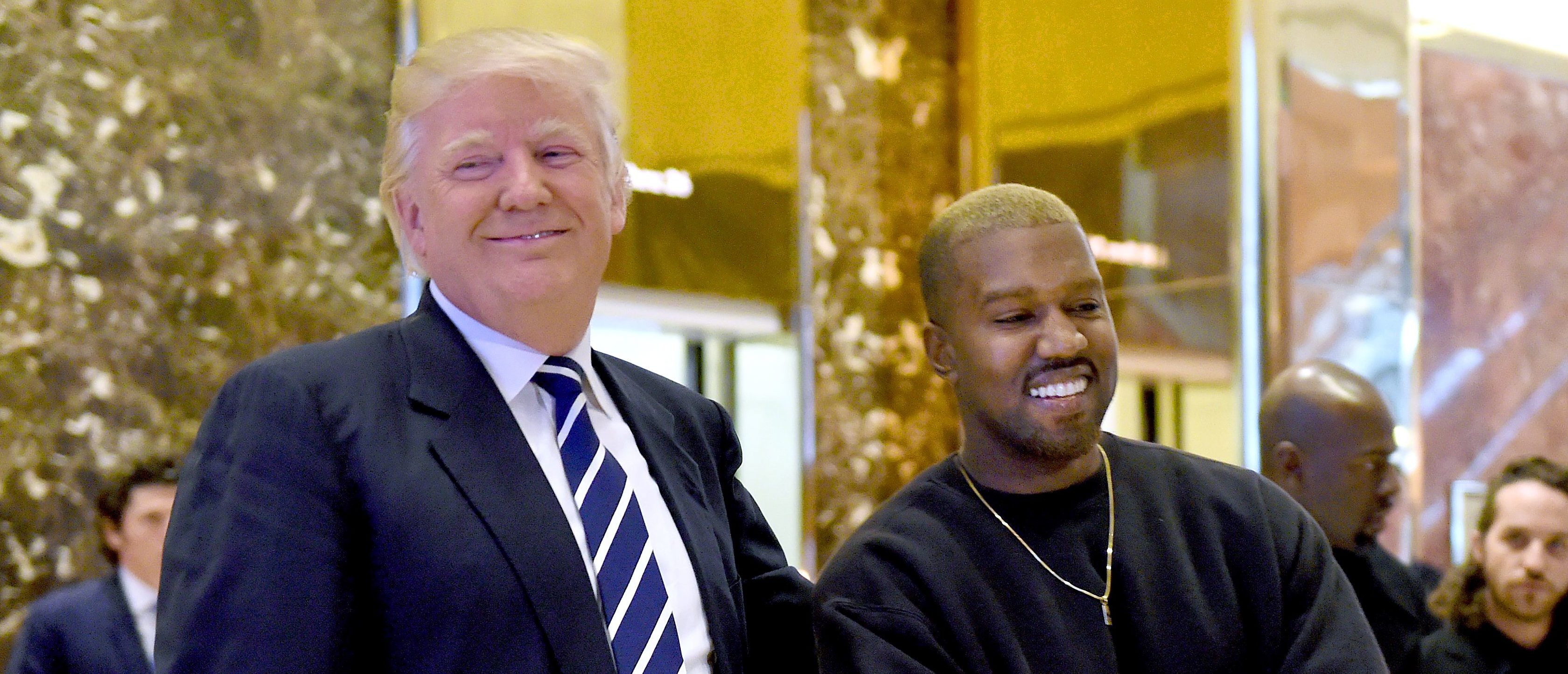 Singer Kanye West and President-elect Donald Trump speak with the press after their meetings at Trump Tower December 13, 2016 in New York. / AFP PHOTO / TIMOTHY A. CLARY (Photo credit should read TIMOTHY A. CLARY/AFP/Getty Images)