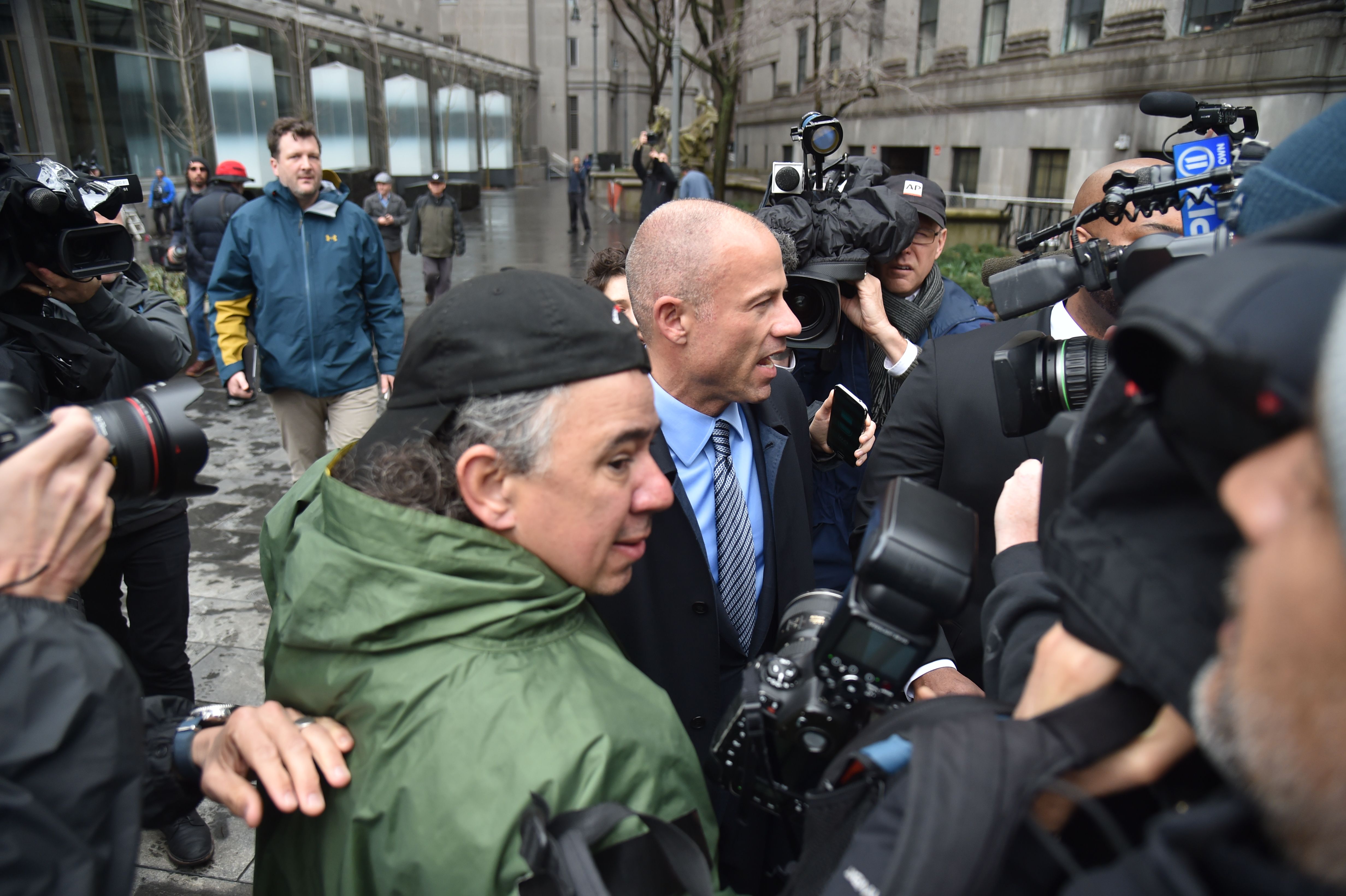 Attorney for Stormy Daniels, Michael Avenatti(C), arrives for a court hearing at the US Courthouse in New York on April 16, 2018. President Donald Trump's personal lawyer Michael Cohen has been under criminal investigation for months over his business dealings, and FBI agents last week raided his home, hotel room, office, a safety deposit box and seized two cellphones. (HECTOR RETAMAL/AFP/Getty Images)