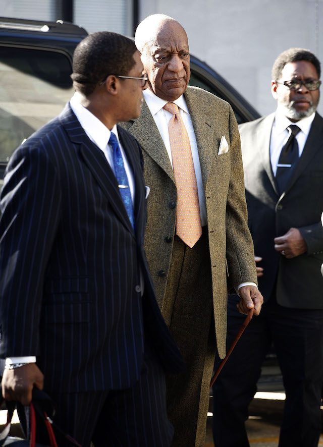 Bill Cosby arrives at court with spokesperson Andrew Wyatton on the first day of jury deliberations as he is retried on charges of Sexual Assault on April 23 2018 at the Montgomery County Courthouse Pictured: Bill Cosby Picture by: Splash News