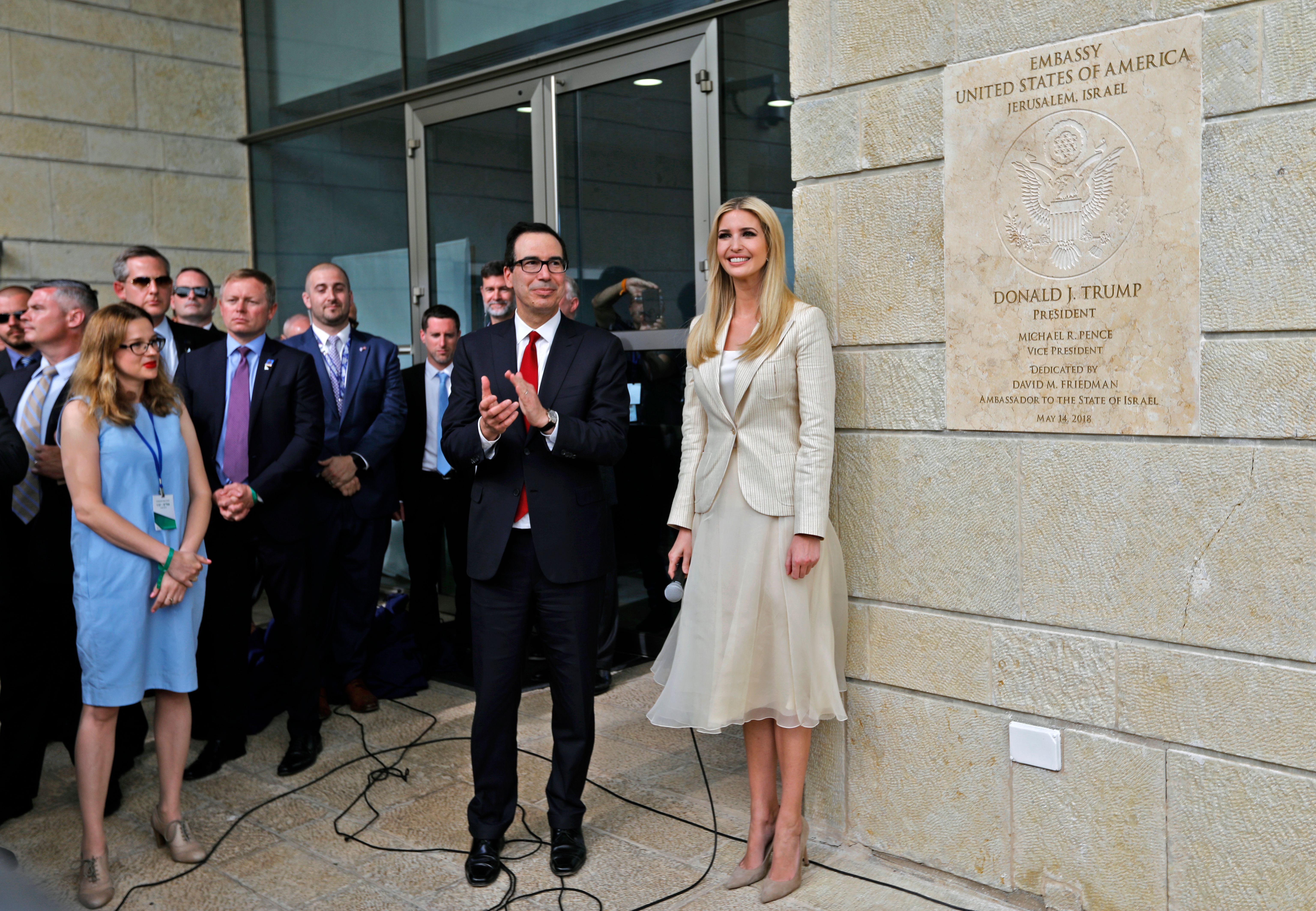 US Treasury Secretary Steve Mnuchin (L) and US President's daughter Ivanka Trump stand next to an inauguration plaque during the opening of the US embassy in Jerusalem on May 14, 2018. - The United States moved its embassy in Israel to Jerusalem after months of global outcry, Palestinian anger and exuberant praise from Israelis over President Donald Trump's decision tossing aside decades of precedent. (Photo by Menahem KAHANA / AFP) (Photo credit should read MENAHEM KAHANA/AFP/Getty Images)