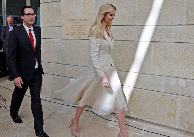 US Treasury Secretary Steve Mnuchin (L) and US President's daughter Ivanka Trump walk after unveiling an inauguration plaque during the opening of the US embassy in Jerusalem on May 14, 2018. - The United States moved its embassy in Israel to Jerusalem after months of global outcry, Palestinian anger and exuberant praise from Israelis over President Donald Trump's decision tossing aside decades of precedent. (Photo by Menahem KAHANA / AFP) (Photo credit should read MENAHEM KAHANA/AFP/Getty Images)