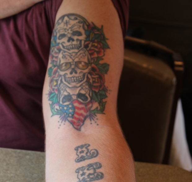 Neimann's tattoo on his left arm depicts "Hear no evil, see no evil, speak no evil" (Julia Nista/The Daily Caller)