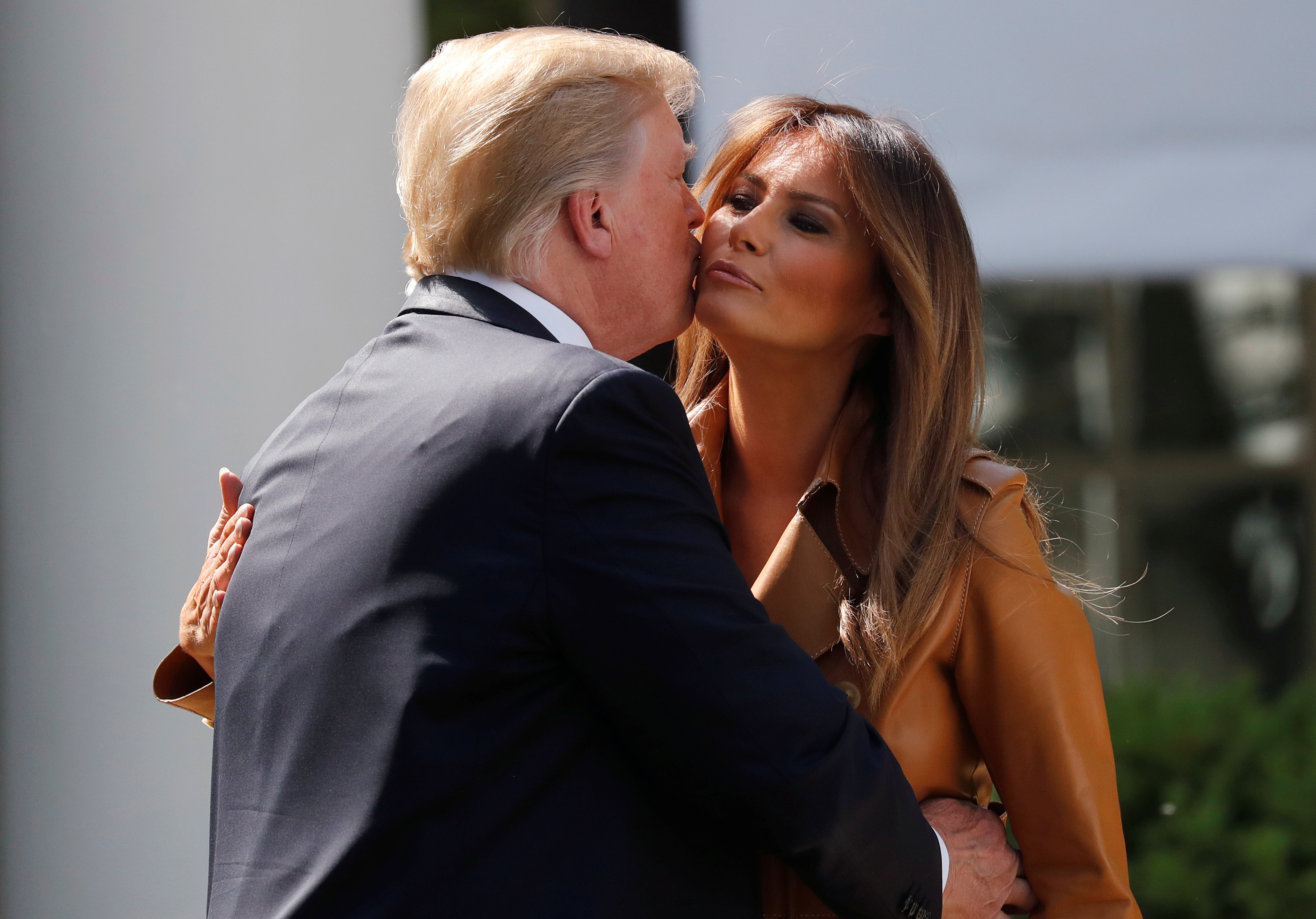 U.S. President Donald Trump kisses first lady Melania Trump at the launch of her "Be Best" initiative in the Rose Garden at the White House in Washington, U.S., May 7, 2018. REUTERS/Leah Millis TPX IMAGES OF THE DAY - RC1F2493C570