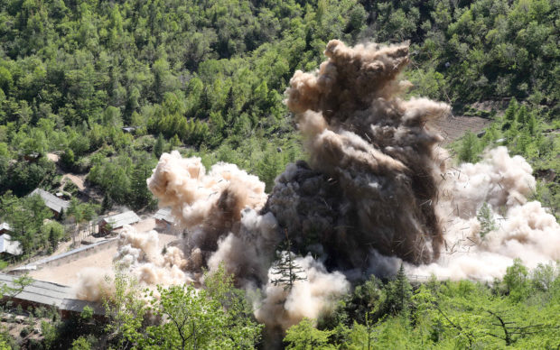 A command post of Punggye-ri nuclear test ground is blown up during the dismantlement process in Punggye-ri, North Hamgyong Province, North Korea May 24, 2018. Picture taken May 24, 2018. News1/Pool via REUTERS