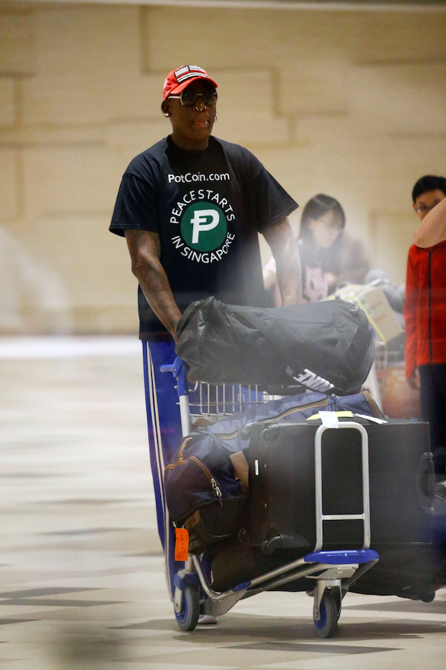 Former basketball player Dennis Rodman arrives at Changi Airport in Singapore, June 12, 2018. REUTERS/Feline Lim - RC1B9B1EBD00