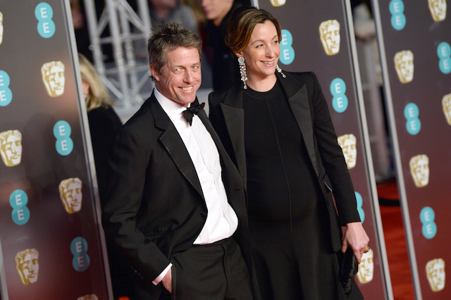 Hugh Grant and Anna Eberstein attend the EE British Academy Film Awards (BAFTA) held at Royal Albert Hall on February 18, 2018 in London, England. (Photo by Jeff Spicer/Jeff Spicer/Getty Images)