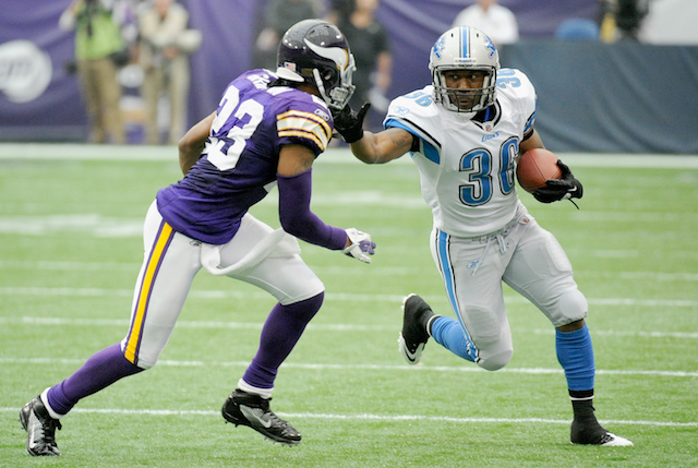 MINNEAPOLIS, MN - SEPTEMBER 25: Cedric Griffin #23 of the Minnesota Vikings looks to tackle as Jerome Harrison #36 of the Detroit Lions carries the ball in the third quarter on September 25, 2011 at Hubert H. Humphrey Metrodome in Minneapolis, Minnesota. The Lions defeated the Vikings 26-23. (Photo by Hannah Foslien/Getty Images) *** Local Caption *** Cedric Griffin;Jerome Harrison