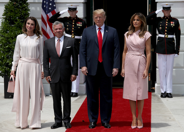 U.S. President Donald Trump and first lady Melania Trump (R) welcome King Abdullah of Jordan and Queen Rania (L) to the White House June 25, 2018 in Washington, DC. Trump and Abdullah are expected to discuss a range of bilateral issues during the King's visit to the White House. (Photo by Win McNamee/Getty Images)