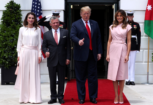 U.S. President Donald Trump and first lady Melania Trump welcome Jordanís King Abdullah and Queen Rania at the White House in Washington, U.S., June 25, 2018. REUTERS/Jonathan Ernst