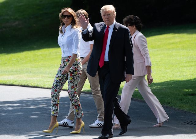 US President Donald Trump (2nd R), First Lady Melania Trump (L), their son Barron (2nd L) and Melania Trump's mother Amalija Knavs (R) walk to board Marine One at the White House in Washington, DC, on June 29, 2018 as they depart for Bedminster, New Jersey. (Photo credit: NICHOLAS KAMM/AFP/Getty Images)