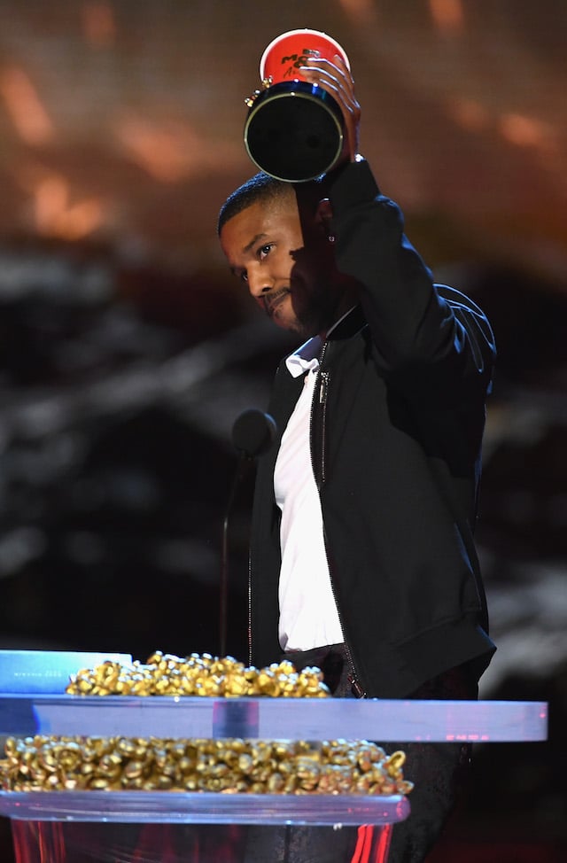 SANTA MONICA, CA - JUNE 16: Actor Michael B. Jordan accepts the Best Villain award for 'Black Panther' onstage during the 2018 MTV Movie And TV Awards at Barker Hangar on June 16, 2018 in Santa Monica, California. (Photo by Kevin Winter/Getty Images for MTV)