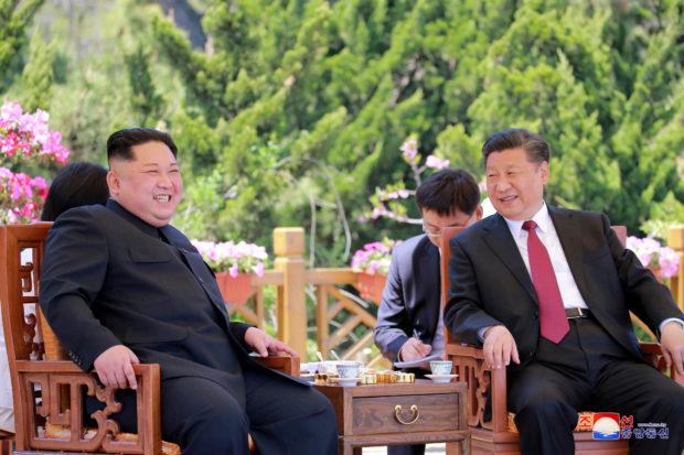 North Korean leader Kim Jong Un meets with China's President Xi Jinping, in Dalian, China in this undated photo released on May 9, 2018 by North Korea's Korean Central News Agency (KCNA). KCNA/via REUTERS 